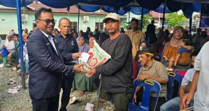 DPD NasDem Tebingtinggi Bagikan 500 Paket Sembako, di Puncak HUT Partai NasDem ke-14 