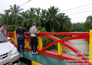 Polsek Bilah Hulu Intensifkan Patroli Antisipasi Banjir di Tengah Cuaca Hujan